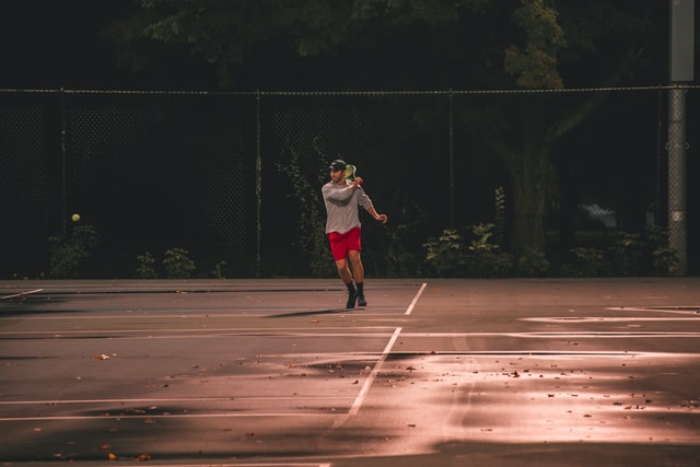 Playing tennis on a wet court