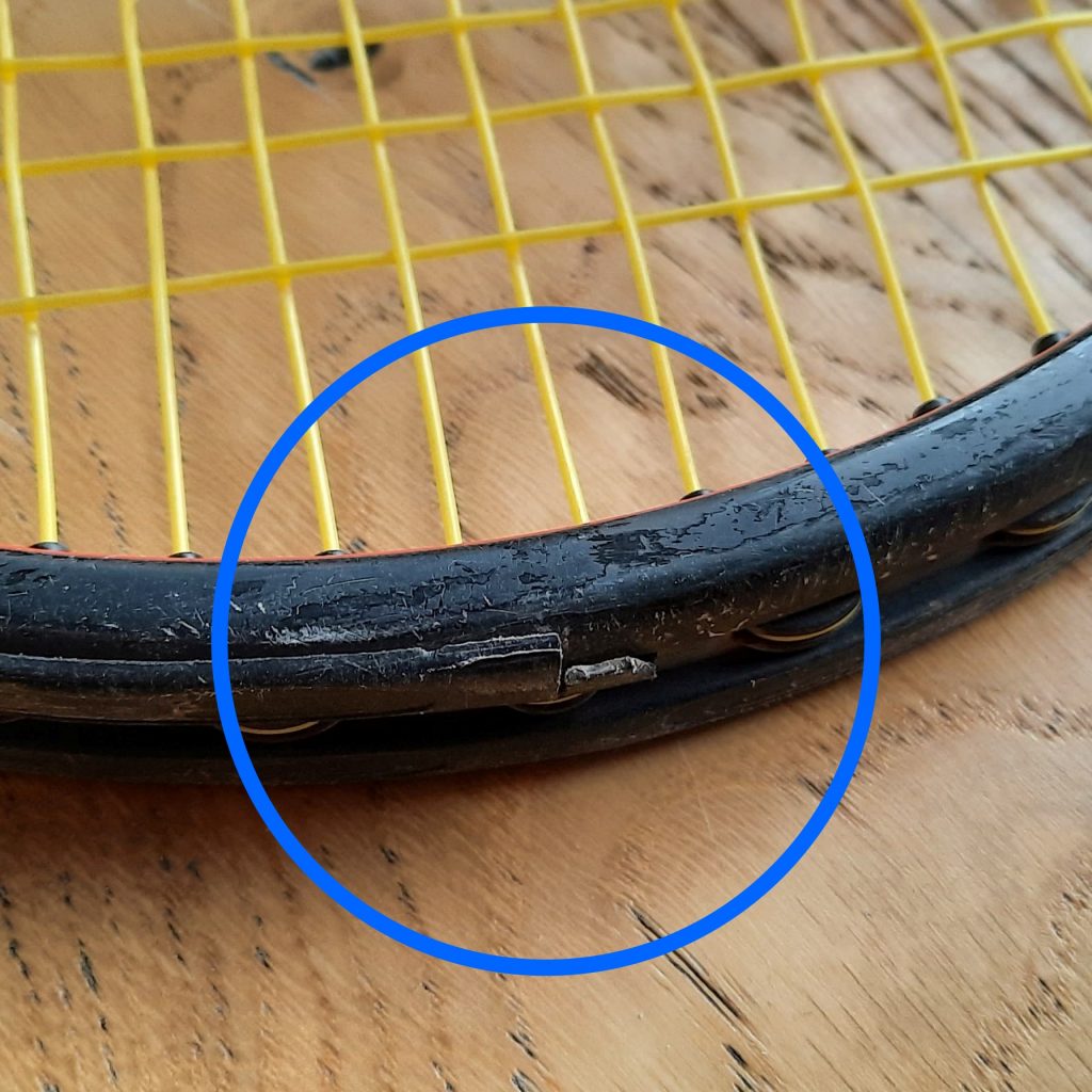 cracked tennis racket