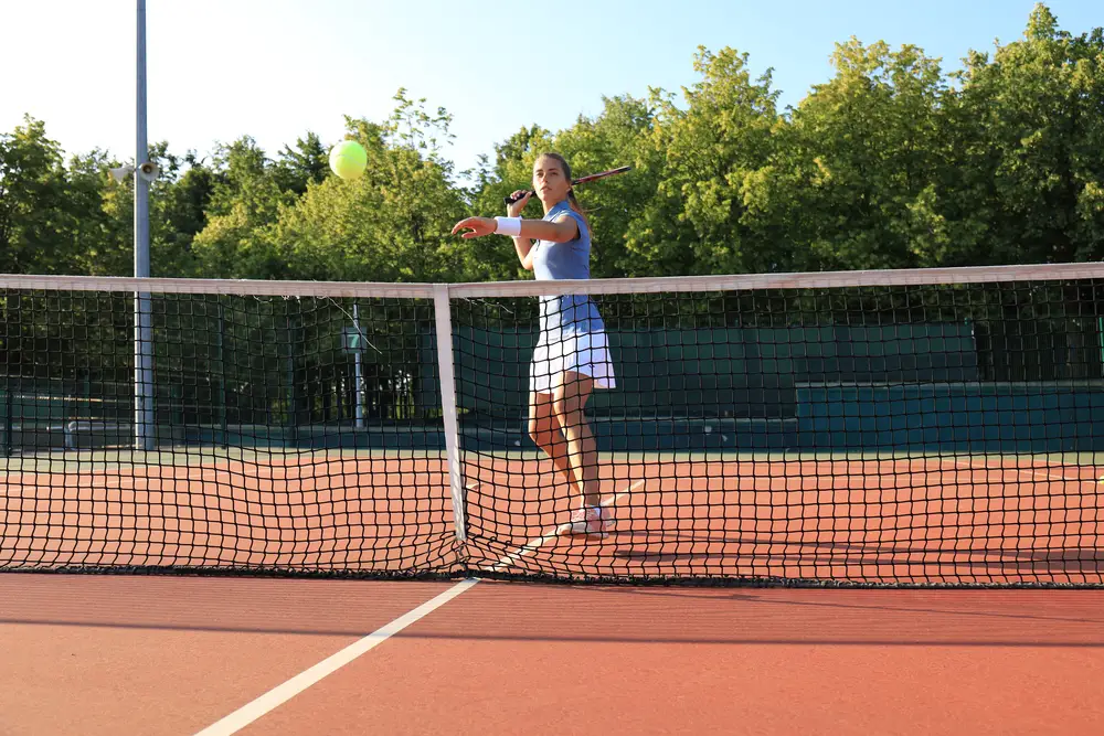 Tennis match reaching the net