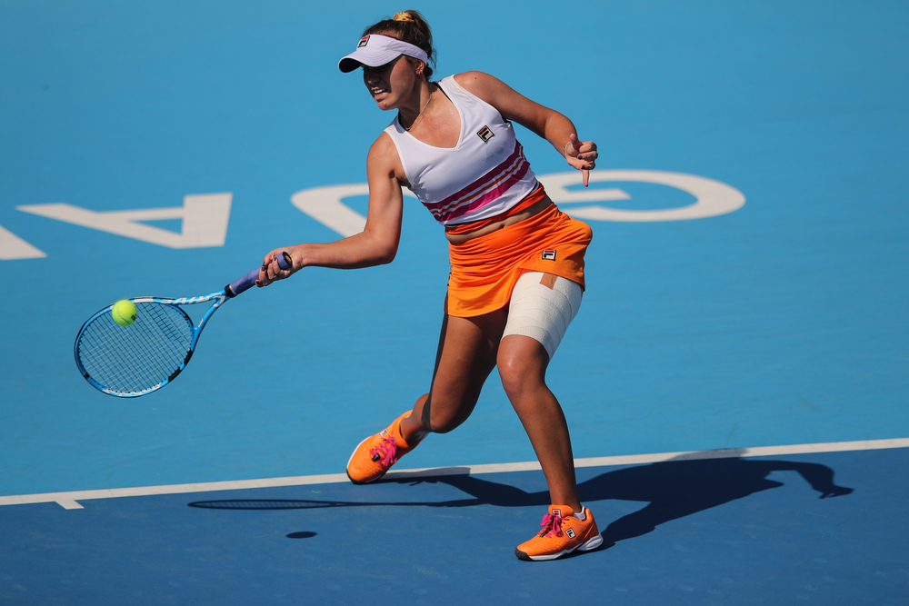 Sofia Kenin of America catches the ball against Samantha Stosur